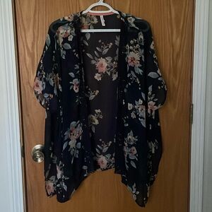 Size xs/s blue floral swimsuit cover or over clothes.